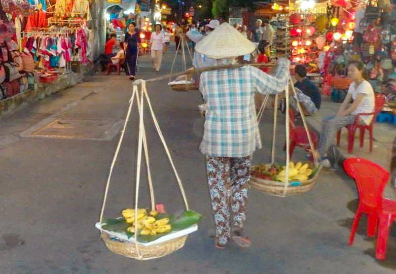 market seller hoi an vietnam